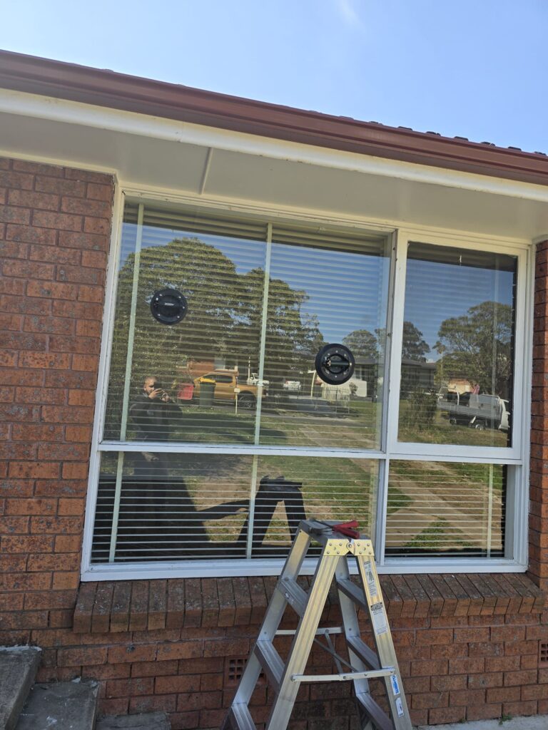 repaired broken window in sydney cbd