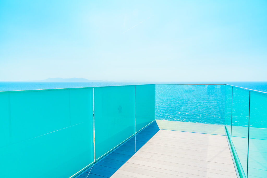 vecteezy a balcony overlooking the ocean with a blue sky 53022975