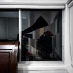 Broken residential window requiring emergency glass replacement in Sydney