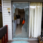 Broken sliding glass door requiring emergency replacement in Sydney