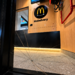 Cracked commercial glass panel requiring urgent replacement at a Sydney business