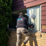 Broken Window Glass Repairs 7 NSW Glass Masters glazier installing residential window glass at a Sydney property