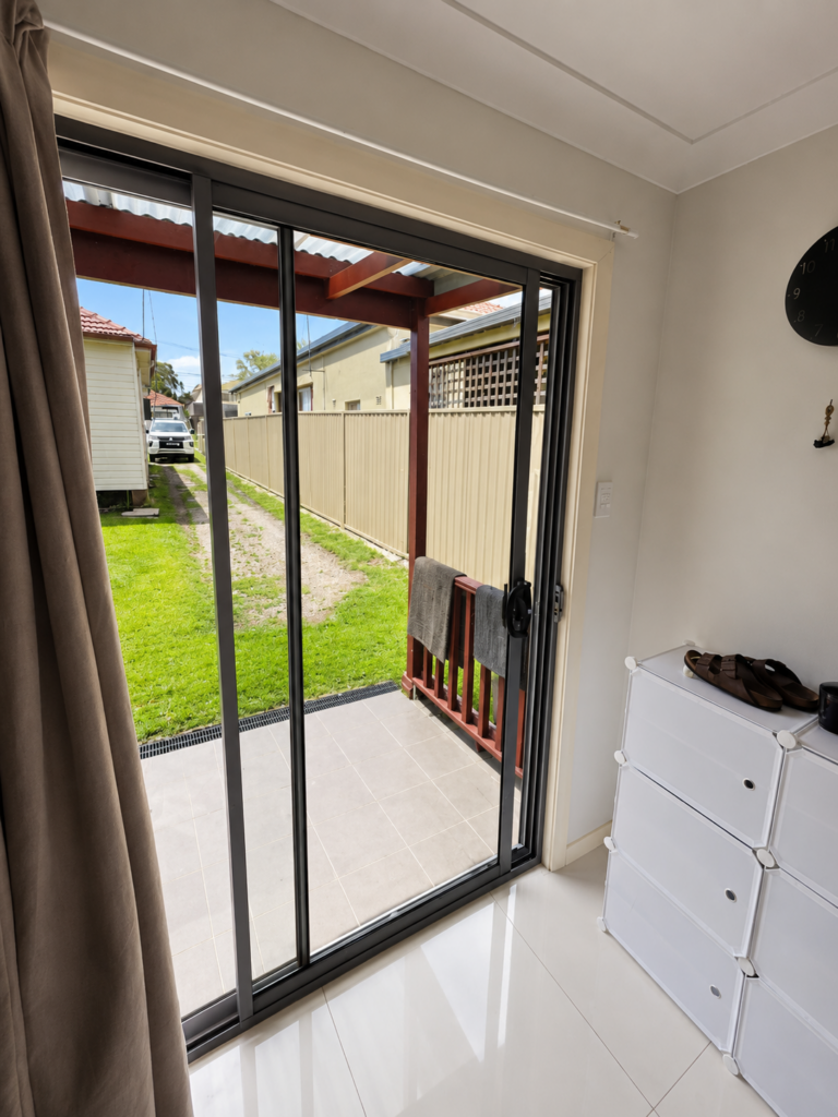 Completed sliding glass door replacement completed by NSW Glass Masters in Sydney.